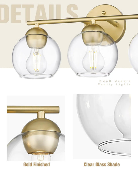 Close-up of 3-Light Gold Bathroom Vanity Light Fixture Over Mirror With Globe Clear Glass Shades, Dope Gold Finish Bath Lighting for Over Sink