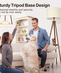 Wood Tripod Floor Lamp With Shelves, Dimmable LED Modern Floor Lamp With Remote Memory Function beside couple and dog