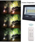 JUDYSSY 100W Led Solar Flood Lights showcasing 3 color temperatures with remote control, IP66 waterproof design.
