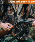 Person using 10 Pack Charge Tubes For Precision Quick Reloads Black Powder Accessories in outdoor setting for reloading
