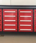 Built Like A Tank 20 Drawer Tool Cabinet With Integrated Workbench And Locking Drawers For Garage Or Shop Featuring Non Slip Pads And Welded Steel Frame, red color.