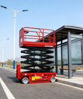Industrial Scissor Lift Platform For Smooth Cargo Transfer And Equipment Maintenance Hydraulic Lifter Beefed Up As A Smooth Operator That Knocks Out Heavy Loads Daily Without Giving You Much Trouble At All near a bus stop.