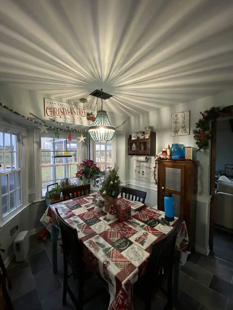 Wood Bead Chandelier Pendant Lights In Gray Blue Finish over dining table with festive decor