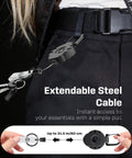 Person wearing a heavy duty retractable keychain with carabiner badge reel, 31.5-inch steel wire rope attached to belt.