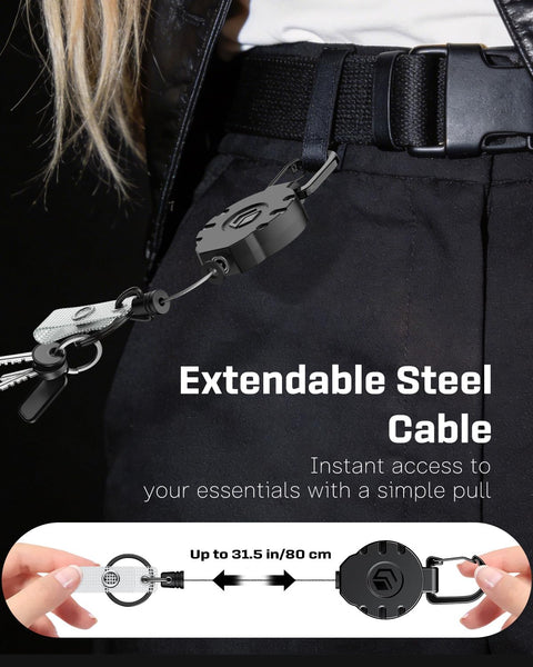 Person wearing a heavy duty retractable keychain with carabiner badge reel, 31.5-inch steel wire rope attached to belt.