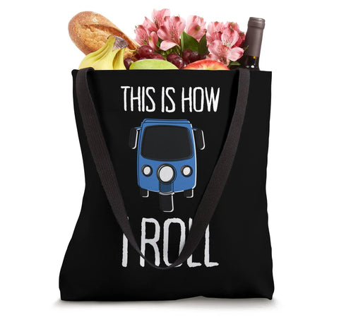 Killer Tuk Tuk Rickshaw Print Tote Bag With Bold East Asia Street Vibes Perfect Carry All Bag For Travelers And Auto Drivers Who Love Bangkok Culture Real Deal Everyday Messenger Bag 16 By 16 Inch filled with groceries and flowers.