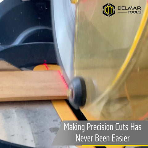 Delmar Tools miter saw laser guide installed on saw projecting red laser line onto wood.