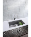 Modern kitchen sink with vegetables, wave-patterned backsplash, and sleek faucet