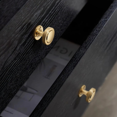 10 Pack Modern Round Cabinet Knobs In Champagne Bronze on black wood cabinet, durable zinc alloy
