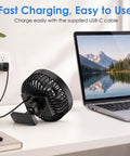 Magnetic Base Golf Cart Portable Fan charging via USB-C next to a laptop, demonstrating ease of use