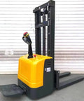 Heavy Duty Electric Warehouse Stacker And Powered Pallet Lifter For Smooth Material Handling In Industrial Warehouses, yellow and black design.