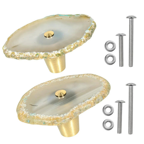 Set Of 4 White Agate Slice Cabinet Knobs With Beautiful Natural Geode Faces And Solid Hardware For Stress Free Kitchen Or Bathroom Drawer Updates That Bring Serious Wow Factor Home. Two knobs shown with brass hardware.