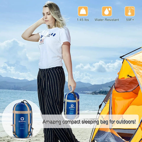 Warm Weather Outdoor Sleeping Bag Waterproof Ultra Lightweight And Compact With Compression Sack on beach with person and tent