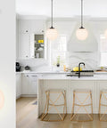 Matte Black Globe Pendant Light 1 Light, Dope Modern Adjustable Hanging Ceiling Fixture For Kitchen Island, White Glass Sphere Shade shown in modern kitchen setting