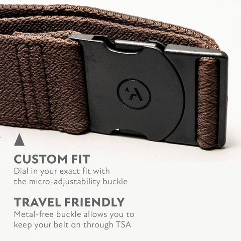 Close-up of Original Unisex Adventure Belt with heavy duty elastic webbing and non-metal buckle, TSA-friendly, medium brown.