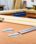 Heavy Duty 2 Pack Sliding Door Rollers For Wood Barn Tracks And Closet Cabinets With Nylon Wheels And Reinforced Steel Brackets on a wood workspace.