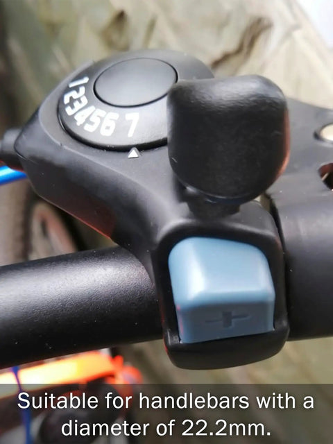Close-up of 3x7 Mountain Bike Thumb Shifter Set With Right Trigger 7 Speed And Left Friction Thumb Lever For Triple Cranksets 1 Meter Cable Beefy Durable Build Easy Install Smooth Crisp Shifts For Offroad Rides on handlebar.
