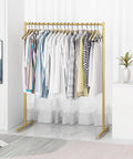 Heavy Duty Free Standing Pipe Clothes Rack With Golden Coat Hanger Durable Drying Rack in a stylish room setting