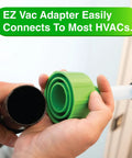 Close-up of AC Drain Line Cleaner Adapter with easy grip elbow, connecting to an HVAC system.