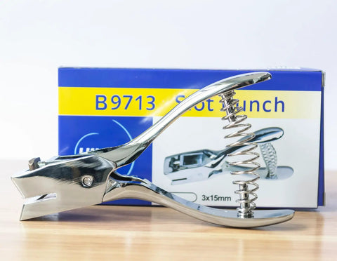 Pro Grade Heavy Duty Handheld ID Card Slot Punch Tool For Lanyards And Badges, metal puncher plier displayed on wooden surface