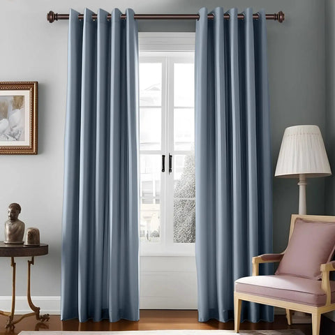 Bronze Heavy Duty Curtain Rods Set 28 to 48 Inches With Classic Finials in use on window in living room with blue curtains.
