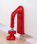 Heavy Duty Adjustable Door Stopper For Home Hotel And Travel Anti Theft Door Blocker For Women Safety Stainless Steel Body With Non Slip Rubber Base Portable Door Guard For Apartment installed against a white door