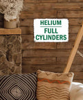 Industrial Vintage Metal Wall Art Sign Featuring Full Helium Cylinders For Rustic Loft Decor Built Tough In Heavy Duty Aluminum Construction Rust Resistant Finish Durable In Humidity And Temperature Fluctuations, 8x12 in on wood wall
