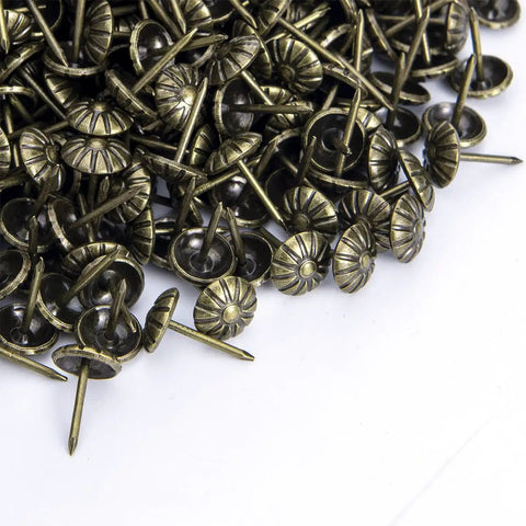 Top Notch Antique Brass Upholstery Tacks Hella Sturdy Daisy Pattern Nails For Diy Furniture Makeover Sweet Home Decor Trim One Hundred Piece Set Seven Sixteenths Inch Thickened Heads, showing decorative fasteners. 100 pack.