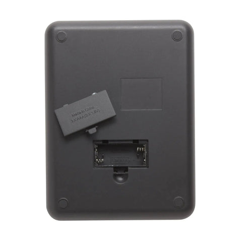 Back view of Glass Top Food Scale With Touch Controls 11 Lb Capacity Sleek Black Kitchen Scale battery compartment open