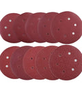 Heavy Duty 6 Inch Hook And Loop Sanding Discs With Anti-Clog Coating For Orbital Sanders, set of eight discs with holes.