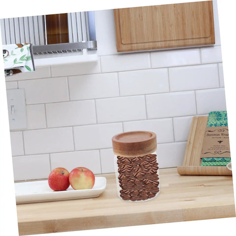 Keep Coffee Beans Fresh As Heck With This Solid 3 Piece Airtight Glass Canister Set Designed For Loose Tea And Spices Compact Footprint Saves Counter Space And Locks In Flavor Straight Up, showcasing a jar filled with coffee beans on a kitchen counter.