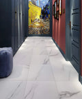 White Peel And Stick Floor Tiles 12x12 Inch 16 Pack Waterproof Vinyl Flooring in hallway with art, blue doors, and red walls.