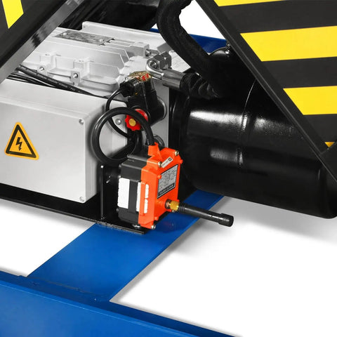 Close-up of motor and hydraulic system on Heavy Duty Wireless Remote Control Electric Hydraulic Lift Table With 2200 Lb Capacity.