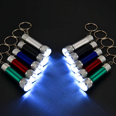 Set Of 30 Mini LED Keychain Flashlights With 5 Bulbs, Ultra Portable Pocket Lights in six colors emitting bright light.