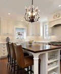Vintage Style K9 Clear Crystal Chandelier Set Of 3 Pendant Lights For Living Room, Bedroom, Restaurant And Porch In Black Finish, Dimmable With E12 Bulbs, Adjustable 39 Inch Chain, Elegant Ceiling Fixture hanging over modern kitchen island