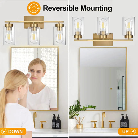 Clean Three Light Bathroom Vanity Wall Sconce In Smooth Brushed Gold Finish With Clear Retro Glass Shades Real Deal Mirror Lighting Hitting Different For Living Room Hallway with reversible mounting.
