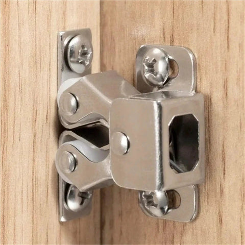 Antique Copper Twin Roller Cabinet Door Catches With Striker And Mounting Screws installed on wooden cabinet