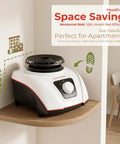 On The Go 1200W Portable Clothes Dryer With Quiet Operation on a small wooden shelf in a compact apartment setup
