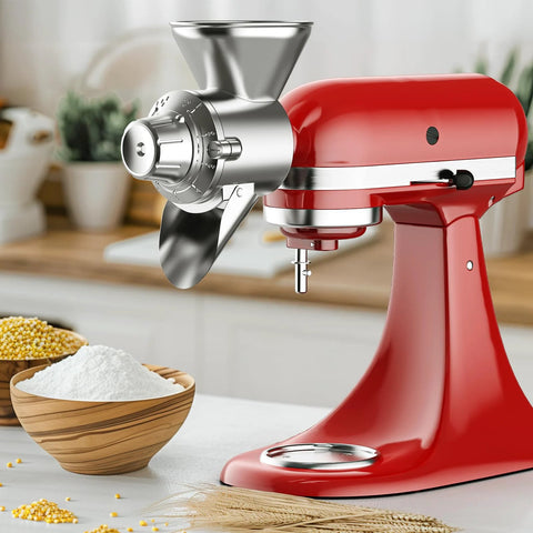 Grain mill attachment for KitchenAid stand mixer; all-metal with silver grinding head on a red mixer
