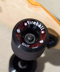 Fireball Dragon inline skate bearings, black wheel with red dragon graphic (front view)