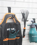 Eight Pack Slatwall Hooks Heavy Duty Garage Organizer For Power Tools And Cords Fits Standard 3 Inch Slat Wall Holds Up To 70 Lbs Durable Wall Hangers For Tool Storage And Cord Management In The Garage Goes Hard For Your Garage in use with garden tools and accessories on white slatwall.