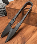 Workhorse Carbon Steel U-Shaped Pruning Shears With Easy Grip Handle, sharp blade, black matte finish, on wooden surface