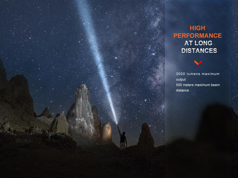 PD40R V3.0 3000 Lumen USB C Rechargeable Flashlight illuminating rock formations at night with long-range beam up to 547 yards