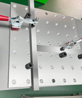 5/8 Inch Insert Clamp Fixture for Welding Tables on benchtop with quick press and sliding jaws, mounted on right angle bracket