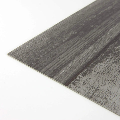 Close-up of Grey Wood Look 12x12 Peel And Stick Floor Tiles, Water Resistant, Durable Virgin Vinyl With Textured Low Luster Finish