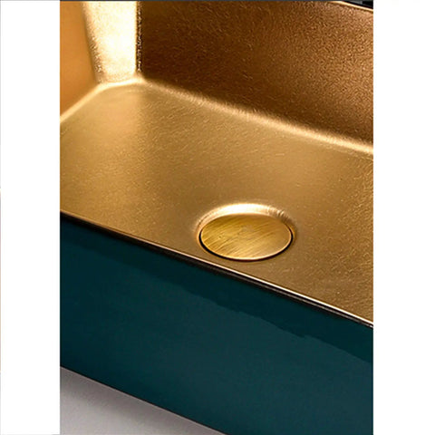 Close-up of Top Shelf Ceramic Vessel Sink For Bathroom Countertops, featuring a gold interior and drain hole.