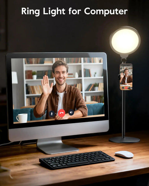 Ring Light With Desk Stand For Video Creation And Makeup, next to a computer illuminating a man on a video call.