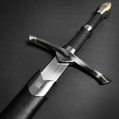 One Hand Medieval Sword Prop With High Carbon Steel Blade 41.25 Inch, black scabbard, close-up of hilt and guard on dark background