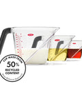 Angled 3 Piece Measuring Cup Set With Read From Above Design Liquid Measuring Cups for Easy Pouring, shown with colored liquids