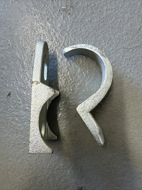 Straight Shooter Clamp Back Spacer And Strap Kit For 2 Inch Electrical Conduit metal parts for secure conduit mounting on walls.